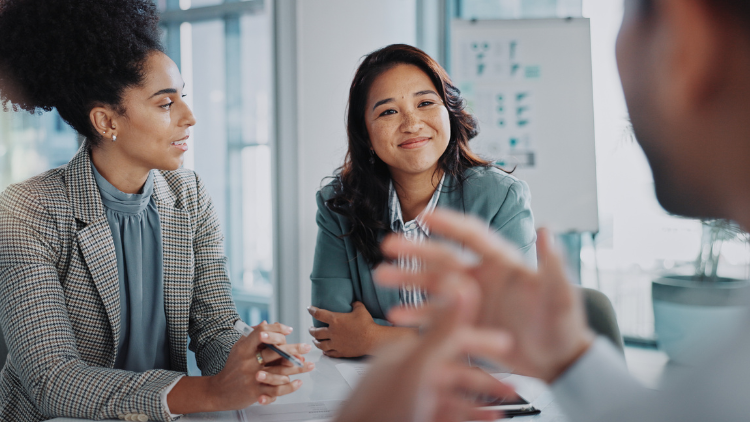 Business professionals having a cheerful discussion